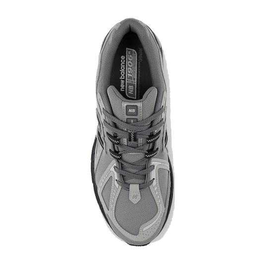 Chaussures New Balance GC1906LG junior, confortables et tendance, avec semelle en caoutchouc robuste.