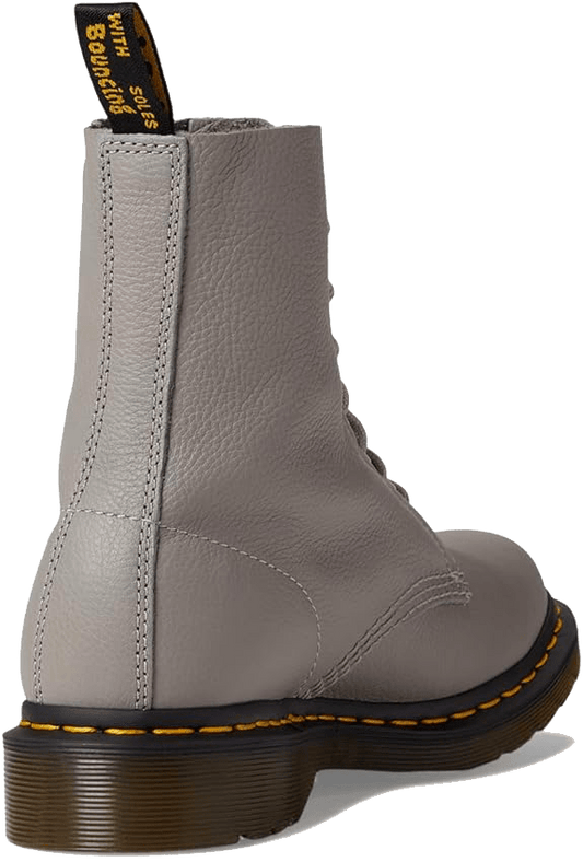 Bottines Doc Martens 1460 Pascal noires, style classique avec languette arrière, coutures jaunes et semelle robuste antidérapante.