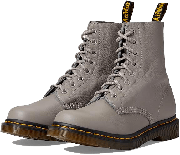 Paire de bottes Doc Martens 1460 Pascal en cuir souple noir, avec surpiqûres jaunes et semelle à coussin d'air emblématique.